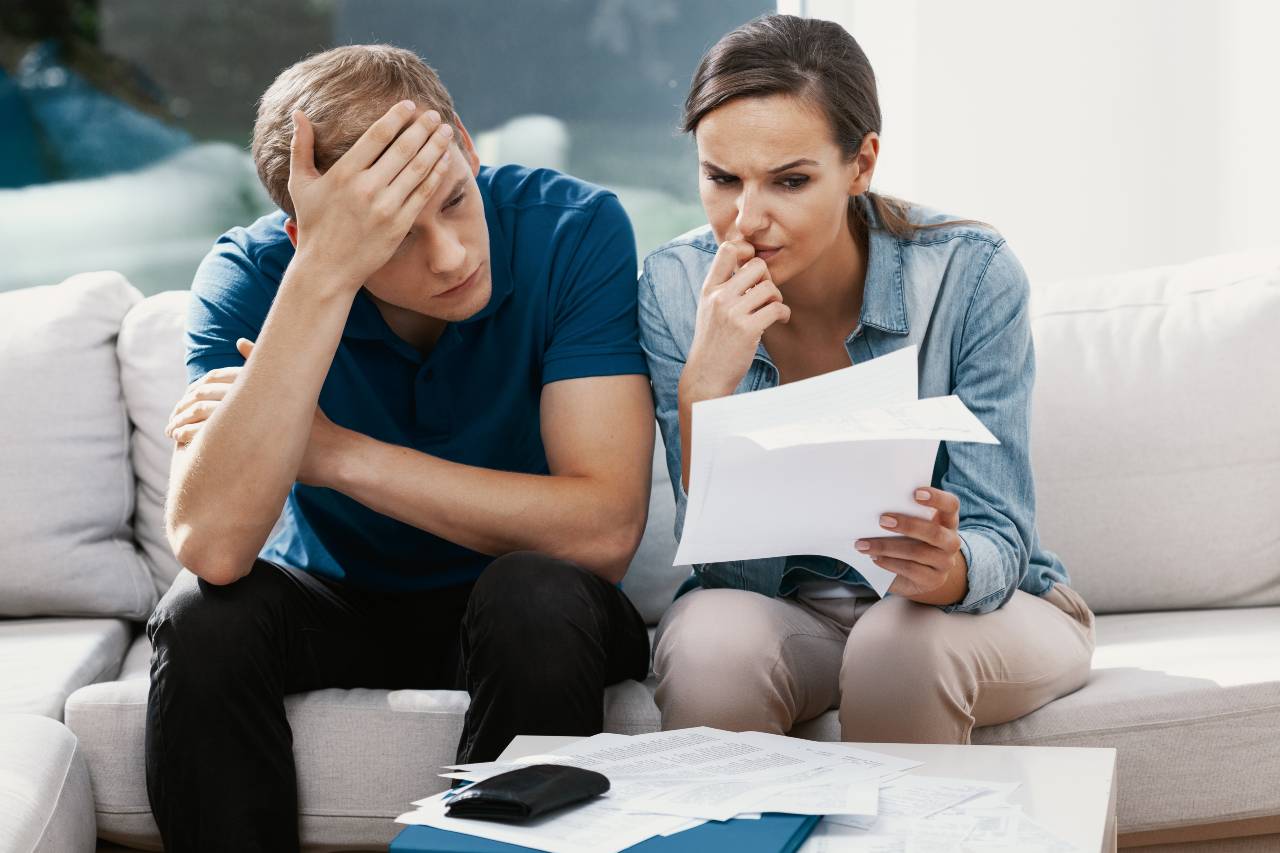couple-looking-at-finances
