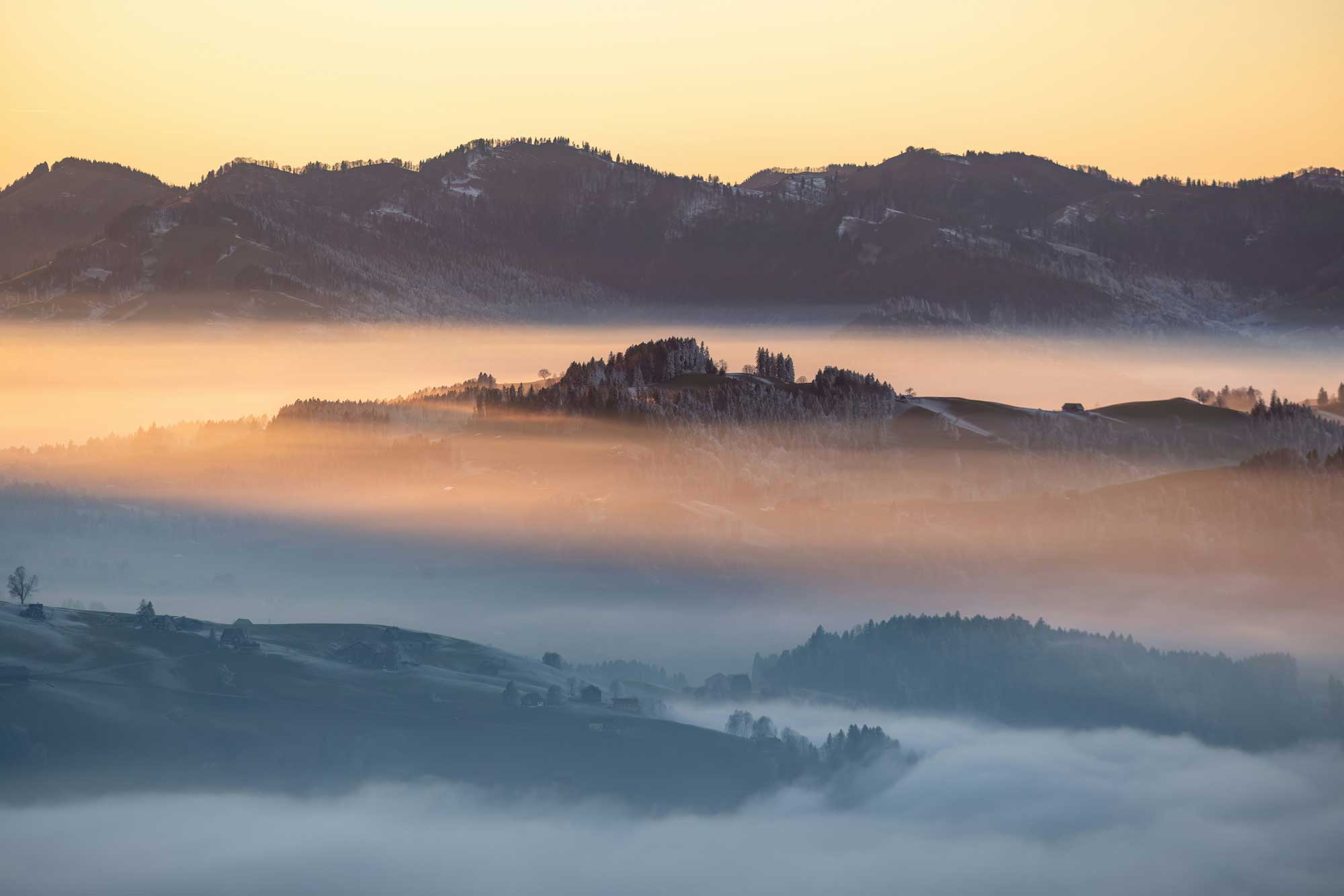 swiss mountain in clouds